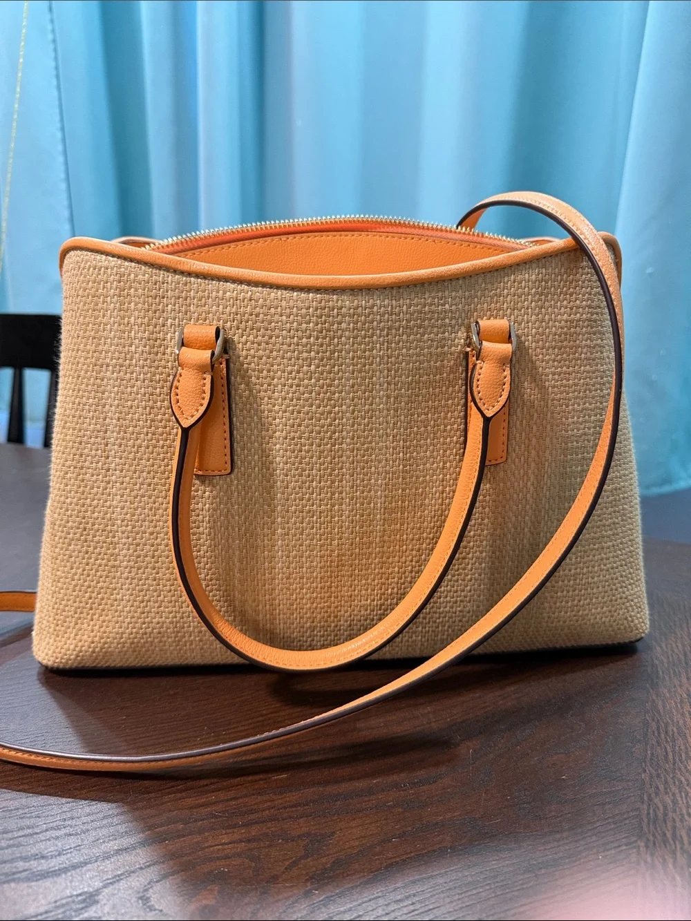 Thompson Street large Kate Spade satchel. Straw with leather orange trim.